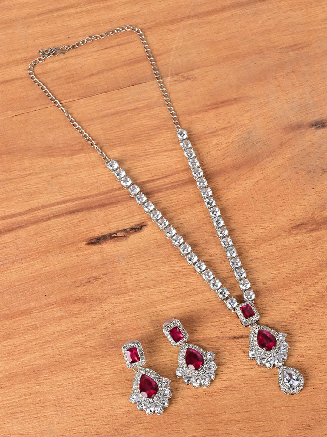 

Keviv Silver Plated American Diamond Studded Necklace With Earrings