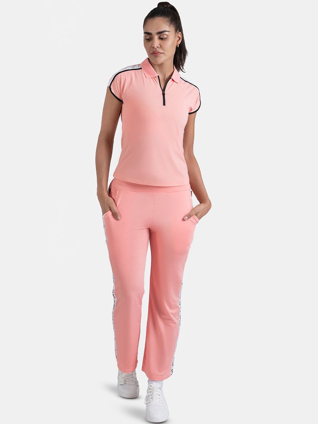 

STRCH Women Mid Rise Breezy Power Stride Double Pockets Track Pants, Peach