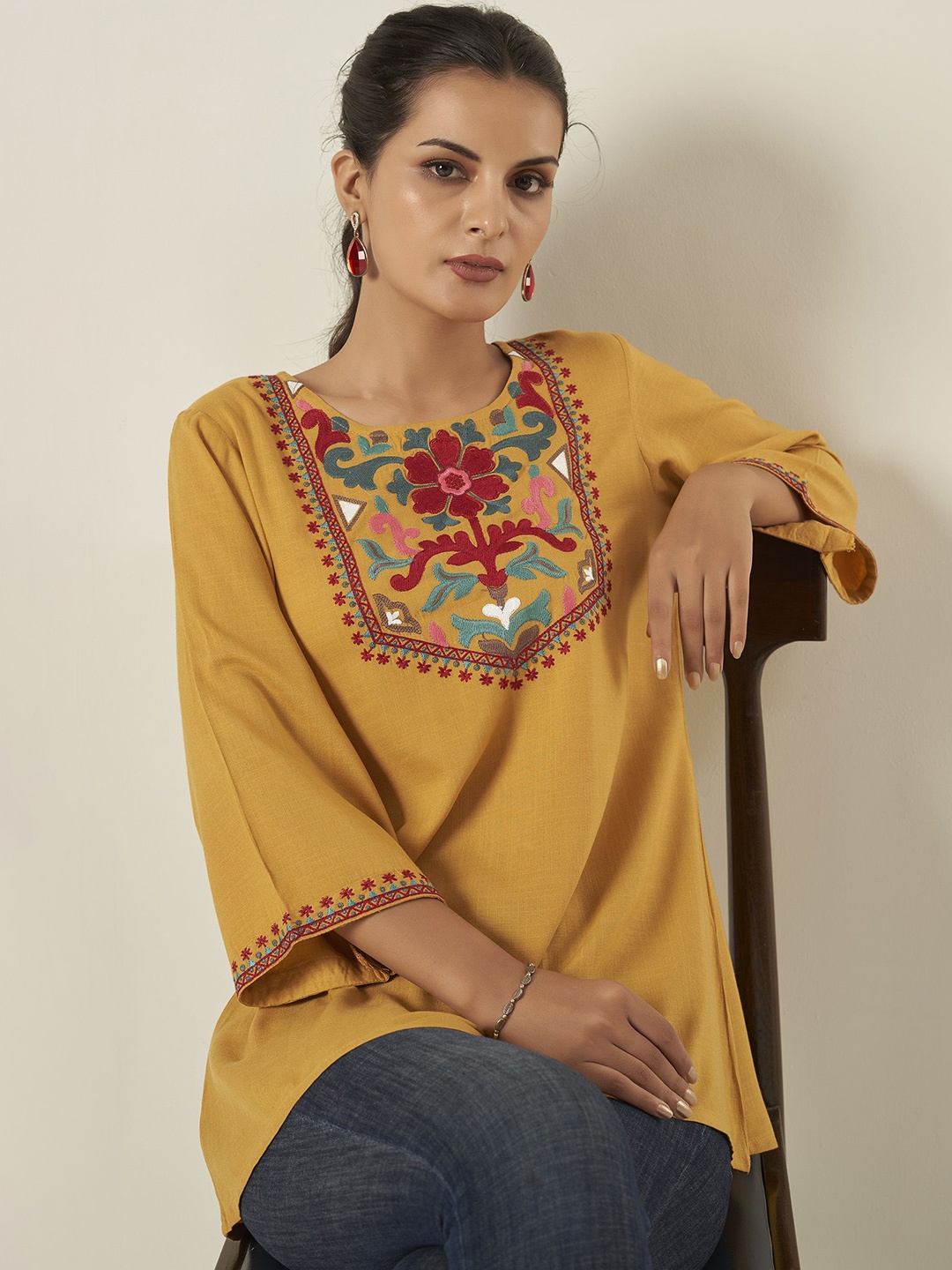 

Anouk Mustard Yellow And Red Embroidered Flared Sleeves Thread Work Liva Straight Kurta