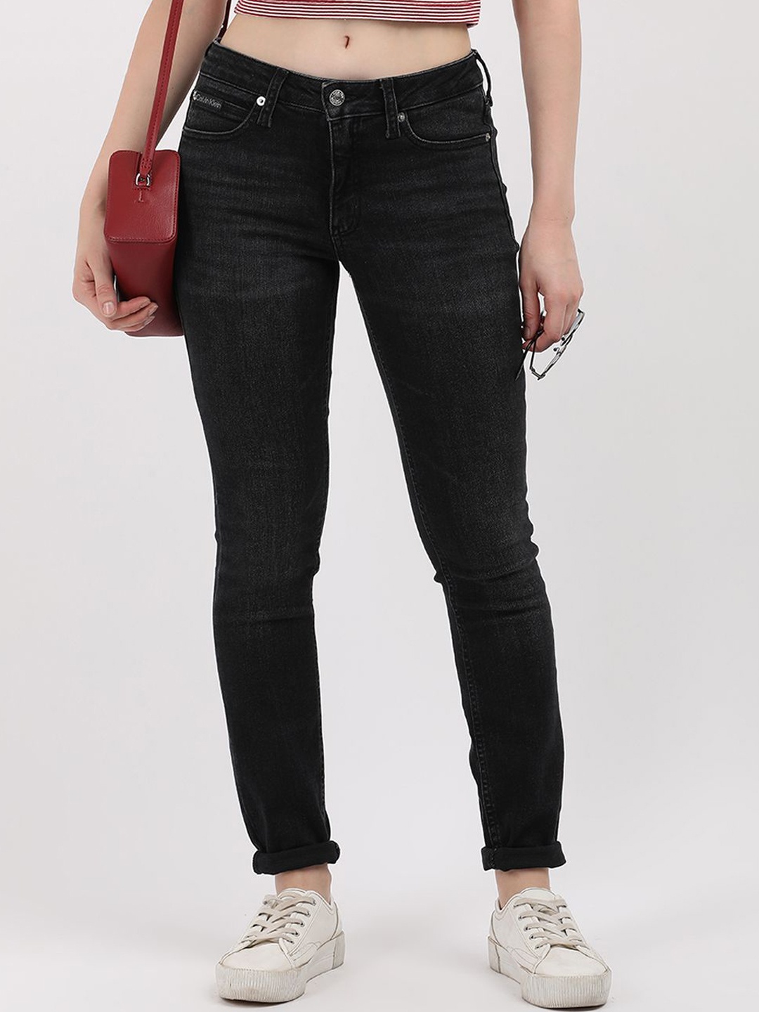 

Calvin Klein Jeans Women Skinny Fit Light Fade Jeans, Black