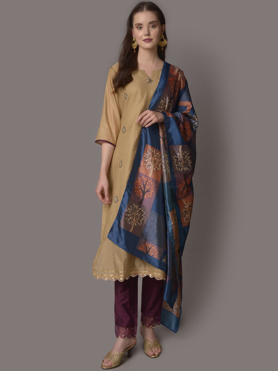 

Shree Ethnic Motifs Embroidered Thread Work Chanderi Silk Kurta With Trousers & Dupatta, Beige