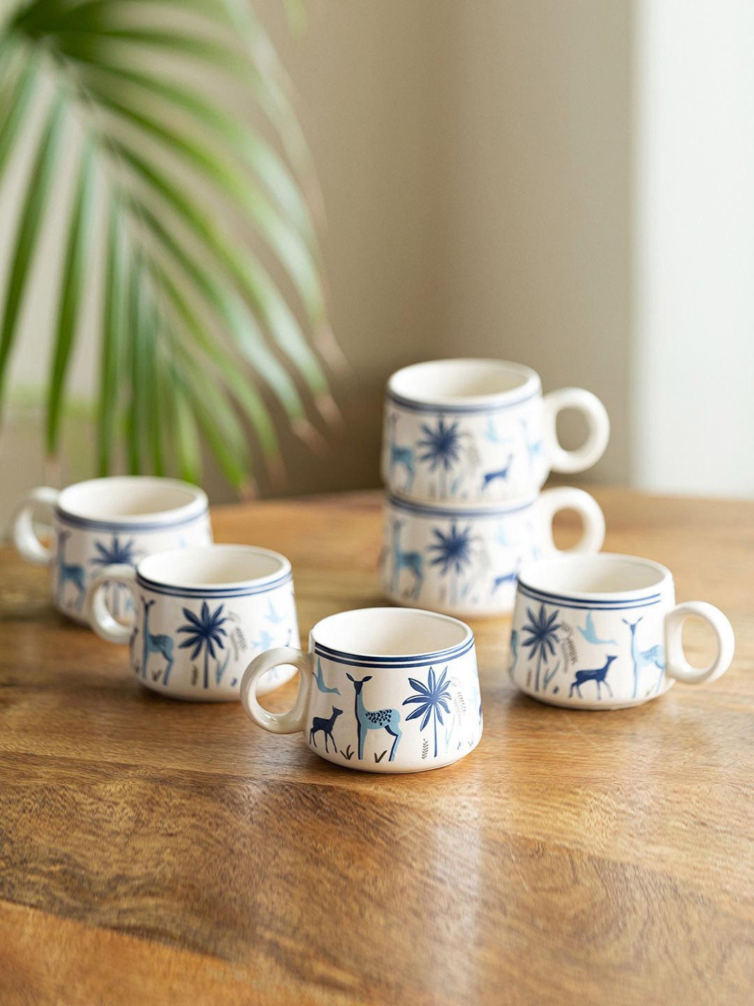 

ExclusiveLane 'Deer & Floral' White & Blue 6 Pieces Printed Ceramic Glossy Cups 150ml Each