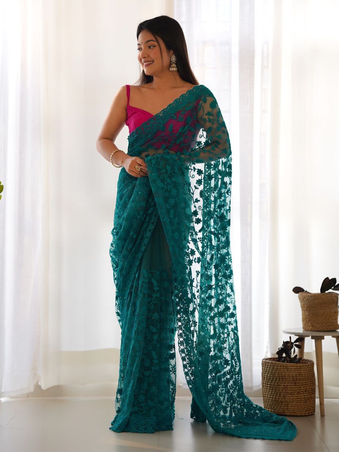 

Celeb Styles Floral Embroidered Net Saree, Turquoise blue