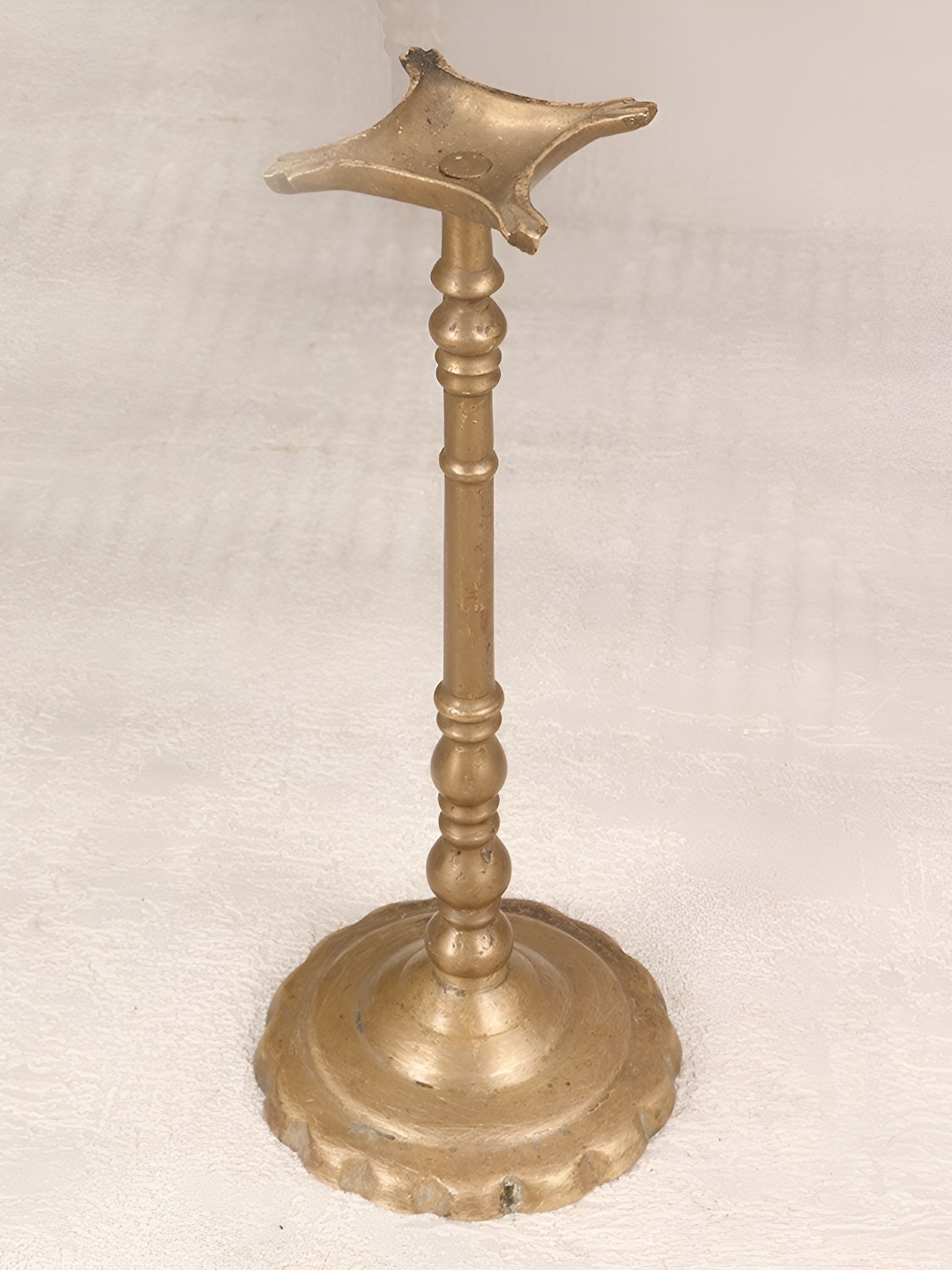 

Indianshelf Gold Toned Textured Brass Diya