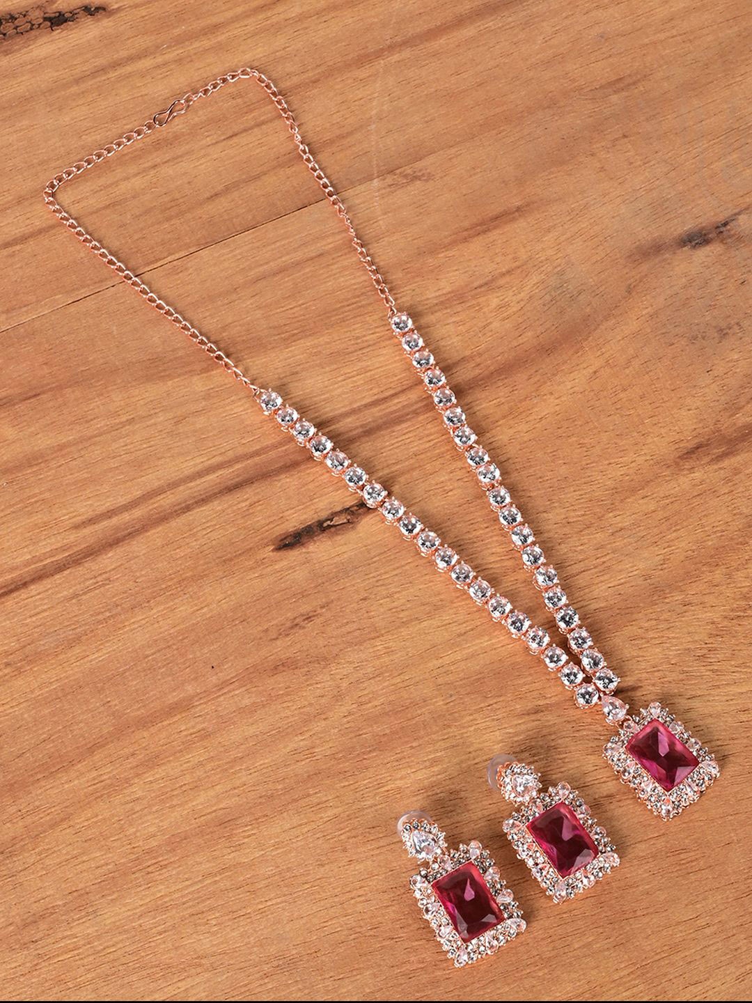 

Keviv Gold Plated American Diamond Studded Necklace With Earrings