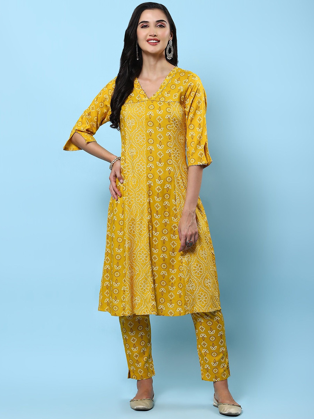 

Shree Floral Printed Gotta Patti Regular A Line Kurta with Trousers, Mustard