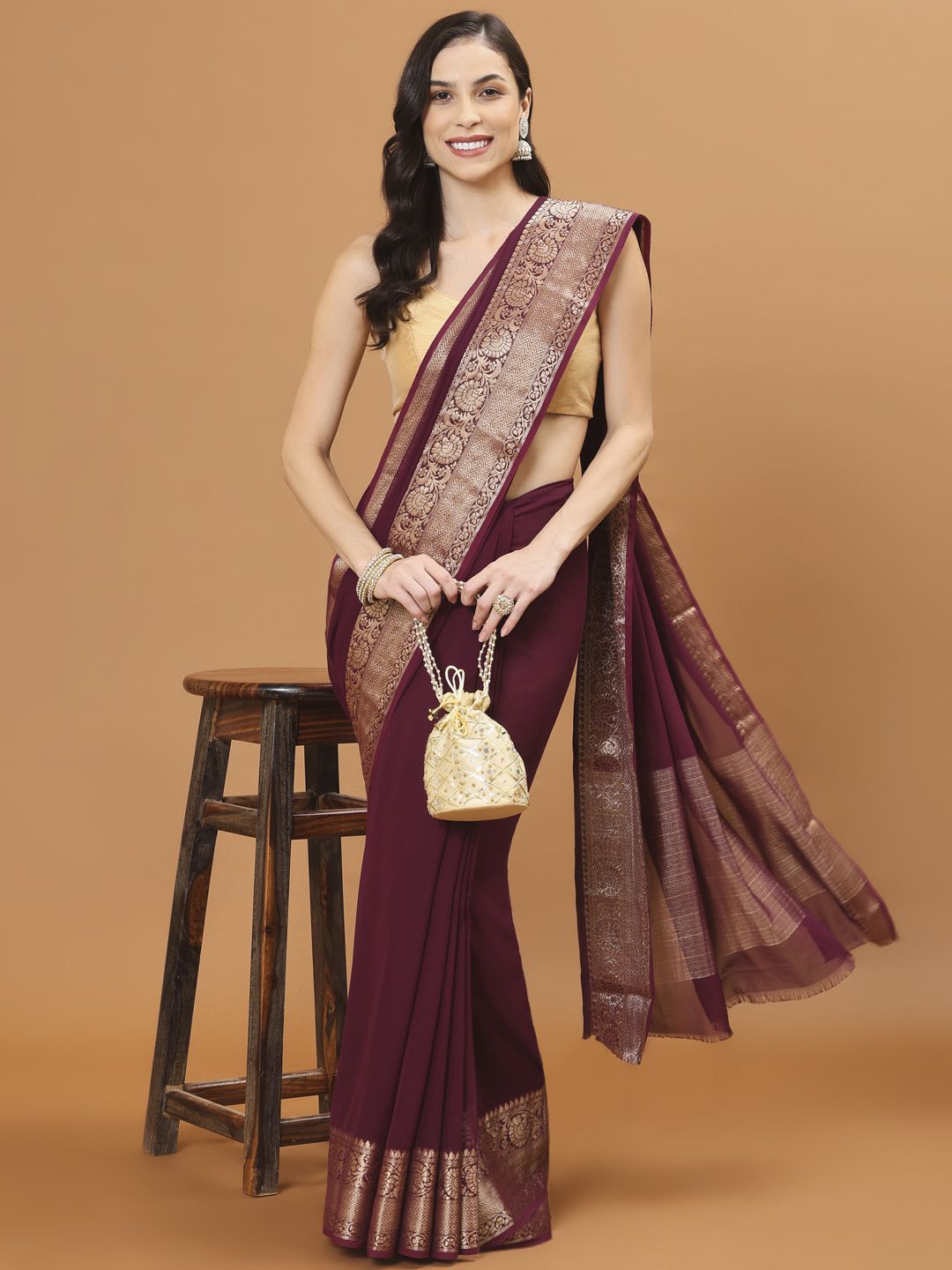 

Meena Bazaar Zari Poly Burgundy Solid Chiffon Saree