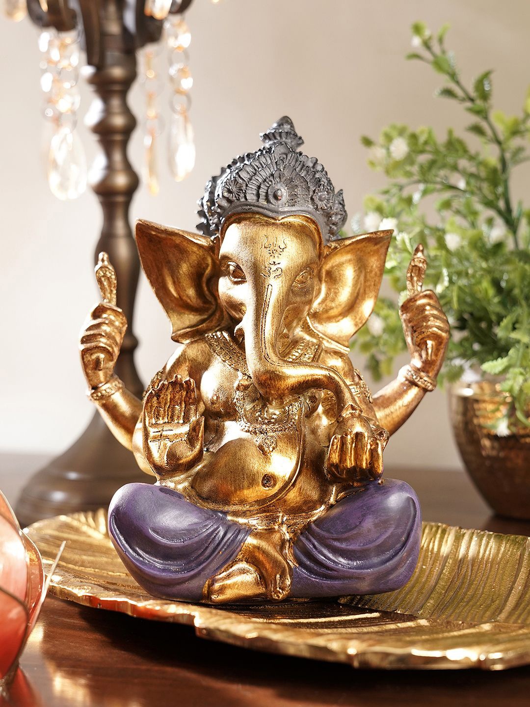 

Pure Home and Living Purple & Gold Toned Ganesha Religious Figurine Showpiece