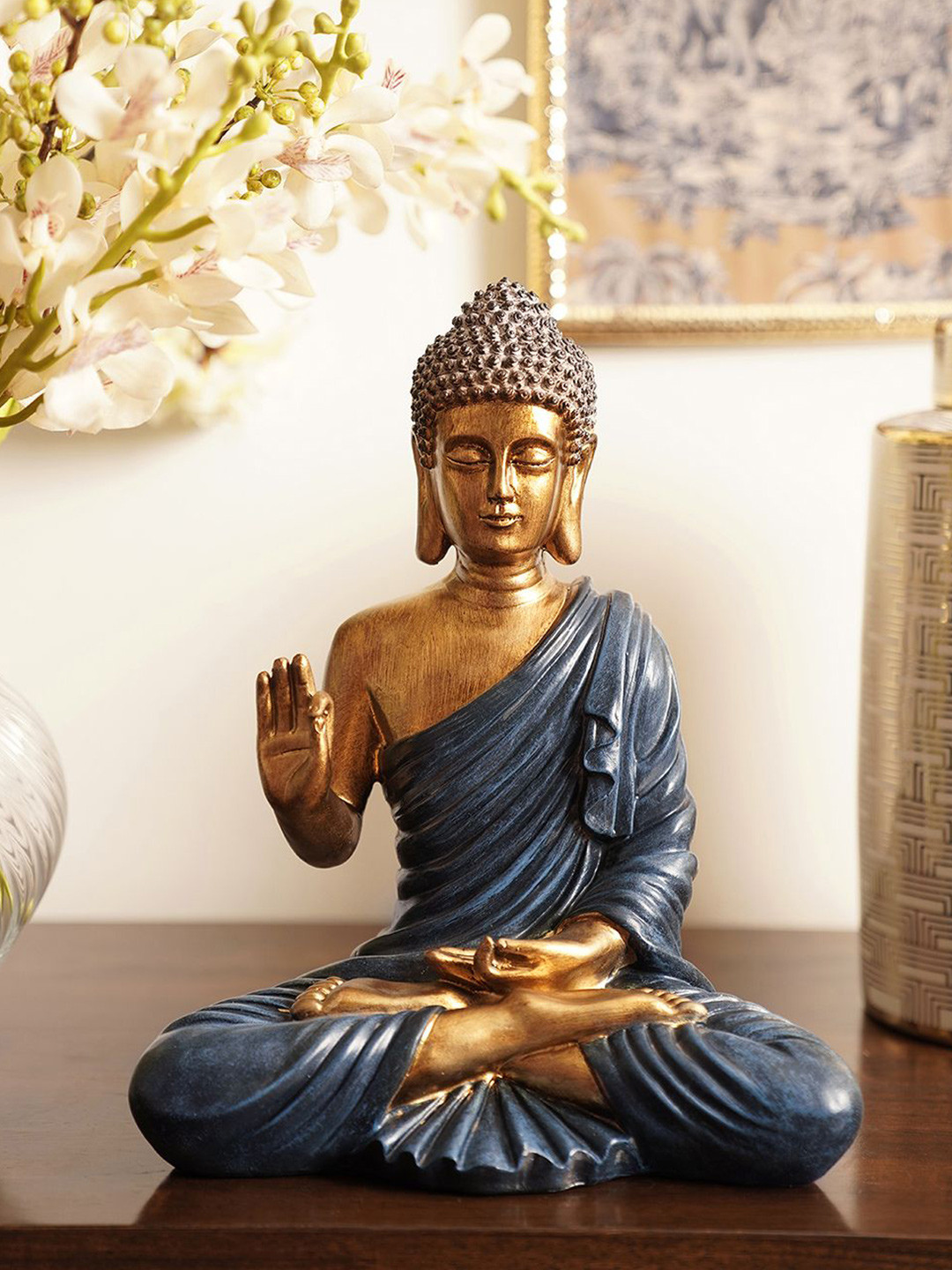

Pure Home and Living Blue & Gold Toned Buddha Idol Showpiece