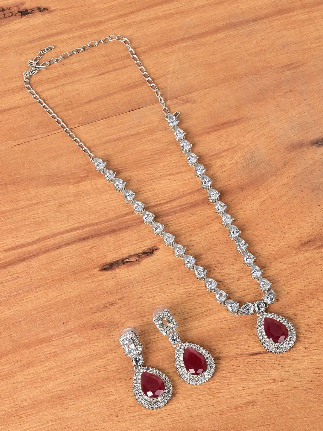 

Keviv Silver-Plated American Diamond Studded Necklace With Earrings
