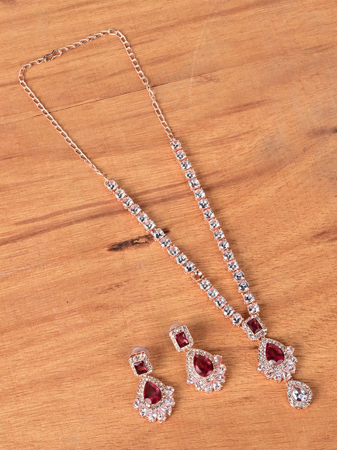 

Keviv Gold Plated American Diamond Studded Necklace With Earrings