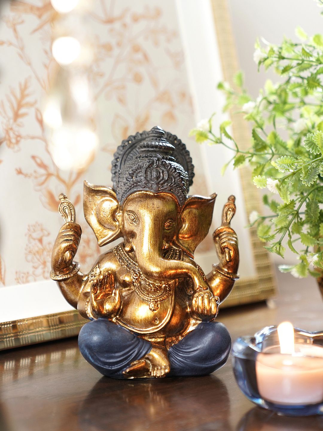

Pure Home and Living Blue & Gold Toned Lord Ganesha Figurine Showpiece