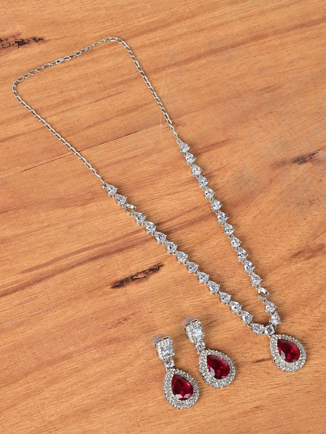 

Keviv Silver-Plated American Diamond Studded Necklace With Earrings