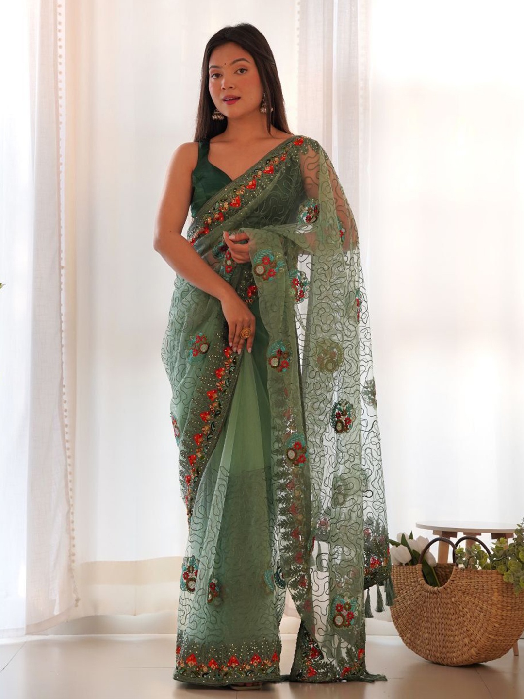 

Celeb Styles Floral Embroidered Net Saree, Green