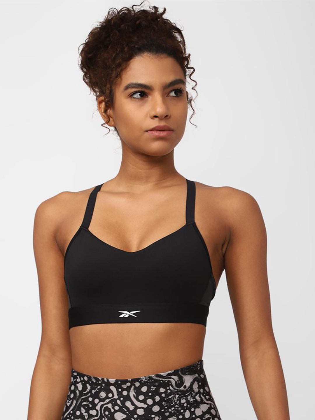 

Reebok Studio Hero Medium-Impact Strappy Bra, Black