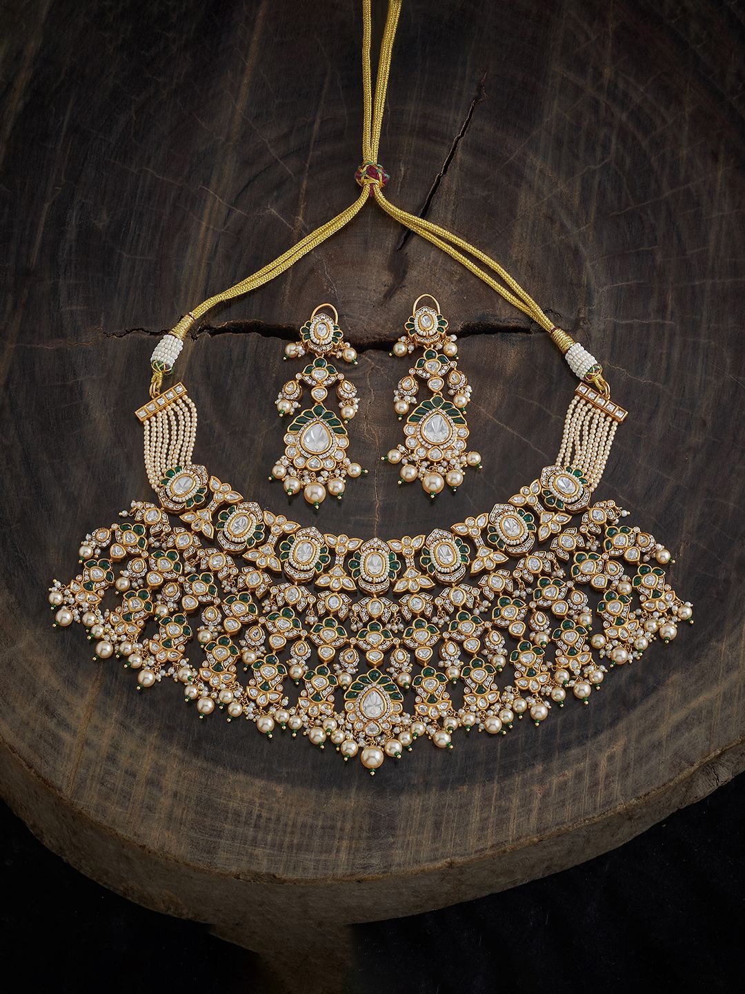 

Kushal's Fashion Jewellery Gold Plated Kundan Studded Necklace and Earrings