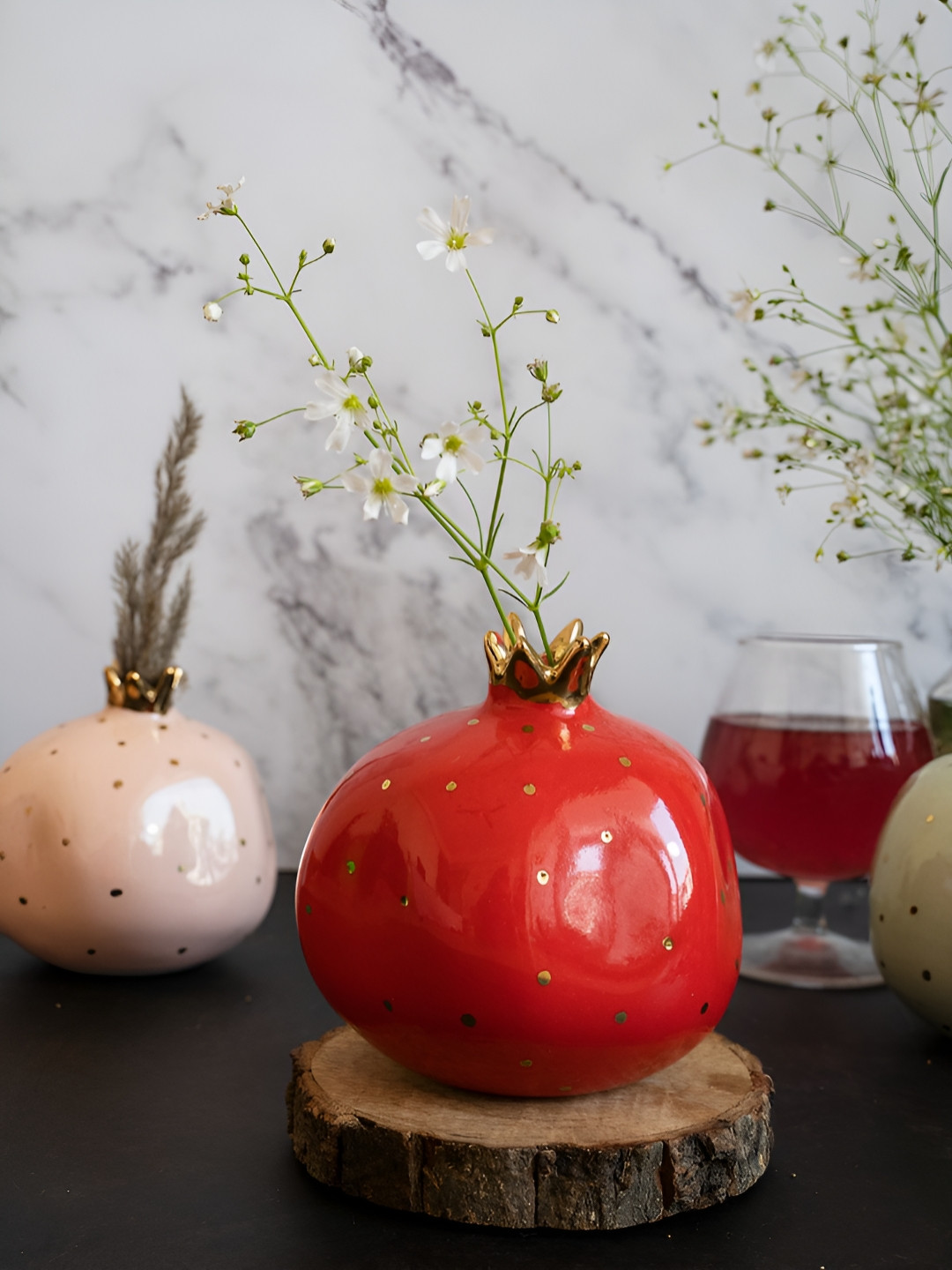

Glimpse Homes Red & Gold Toned Pomegranate Figurine Showpiece