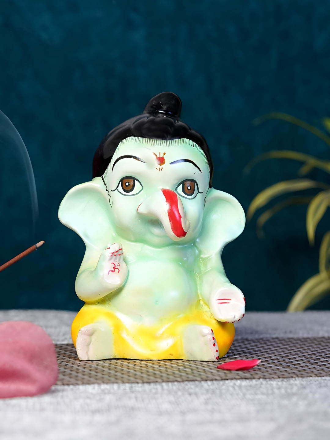 

Lupaava Green Lord Ganesha Idol Showpiece