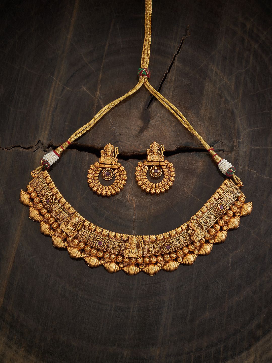 

Kushal's Fashion Jewellery Gold-Plated Stones-Studded Antique Necklace and Earrings