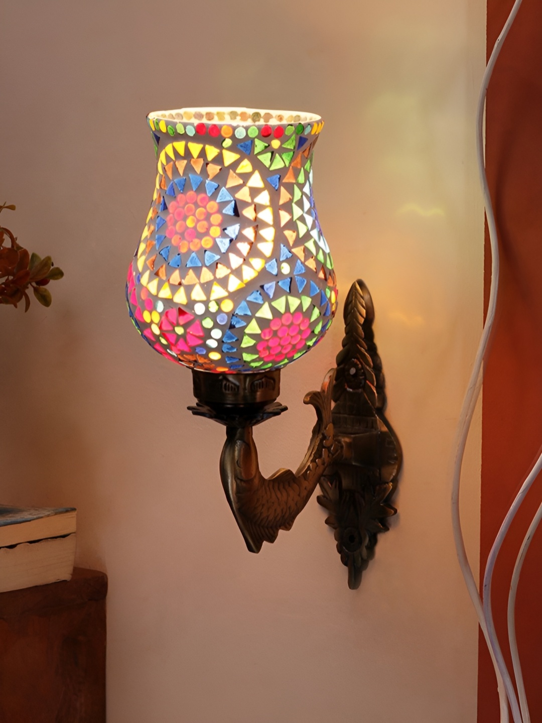 

Devansh Gold-Toned & White Floral Textured Bell Shaped Metal & Glass Wall Lamp