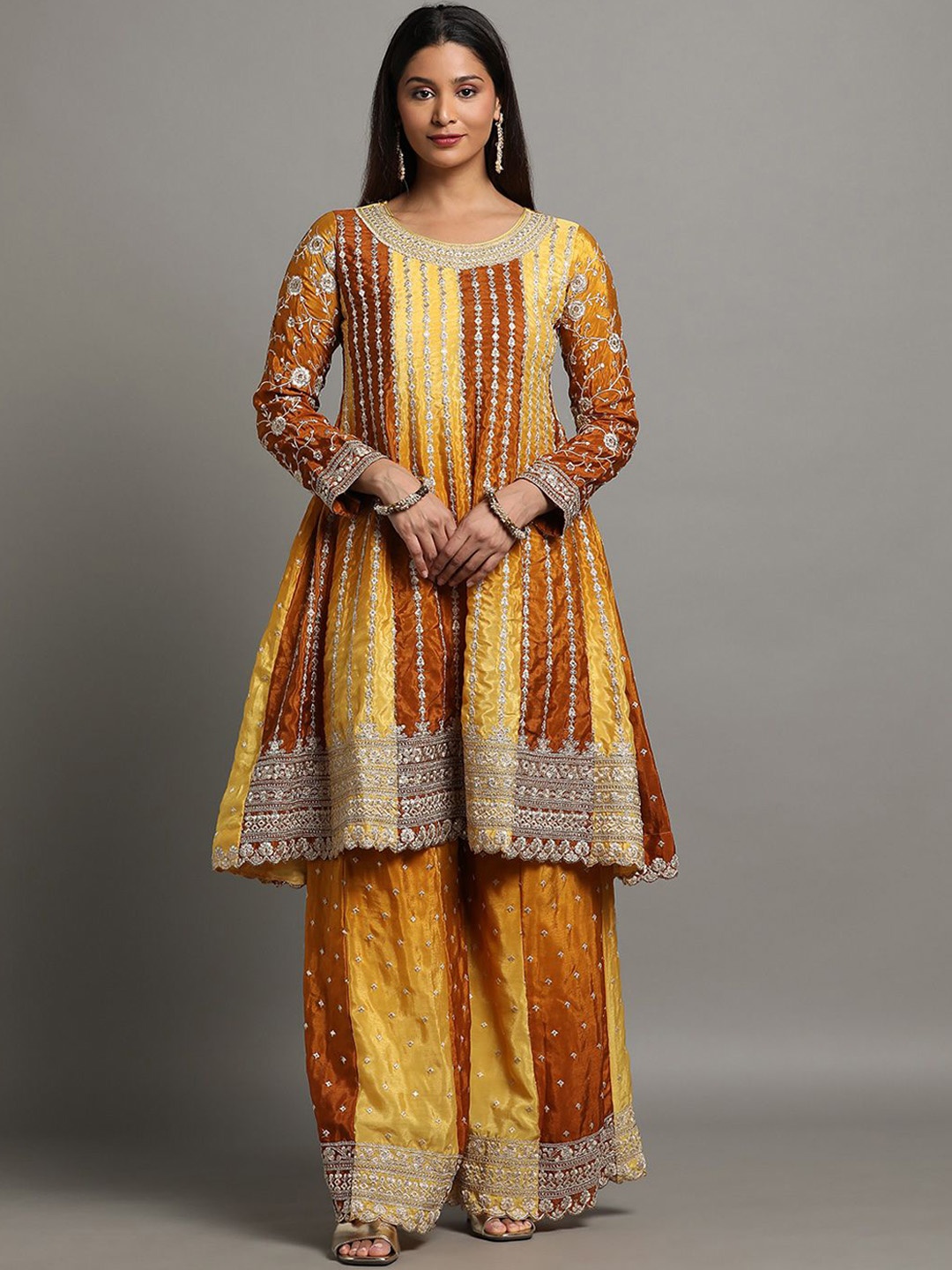 

Miss Ethnik Ethnic Motifs Embroidered Sequinned A-Line Kurta with Sharara & Dupatta, Yellow