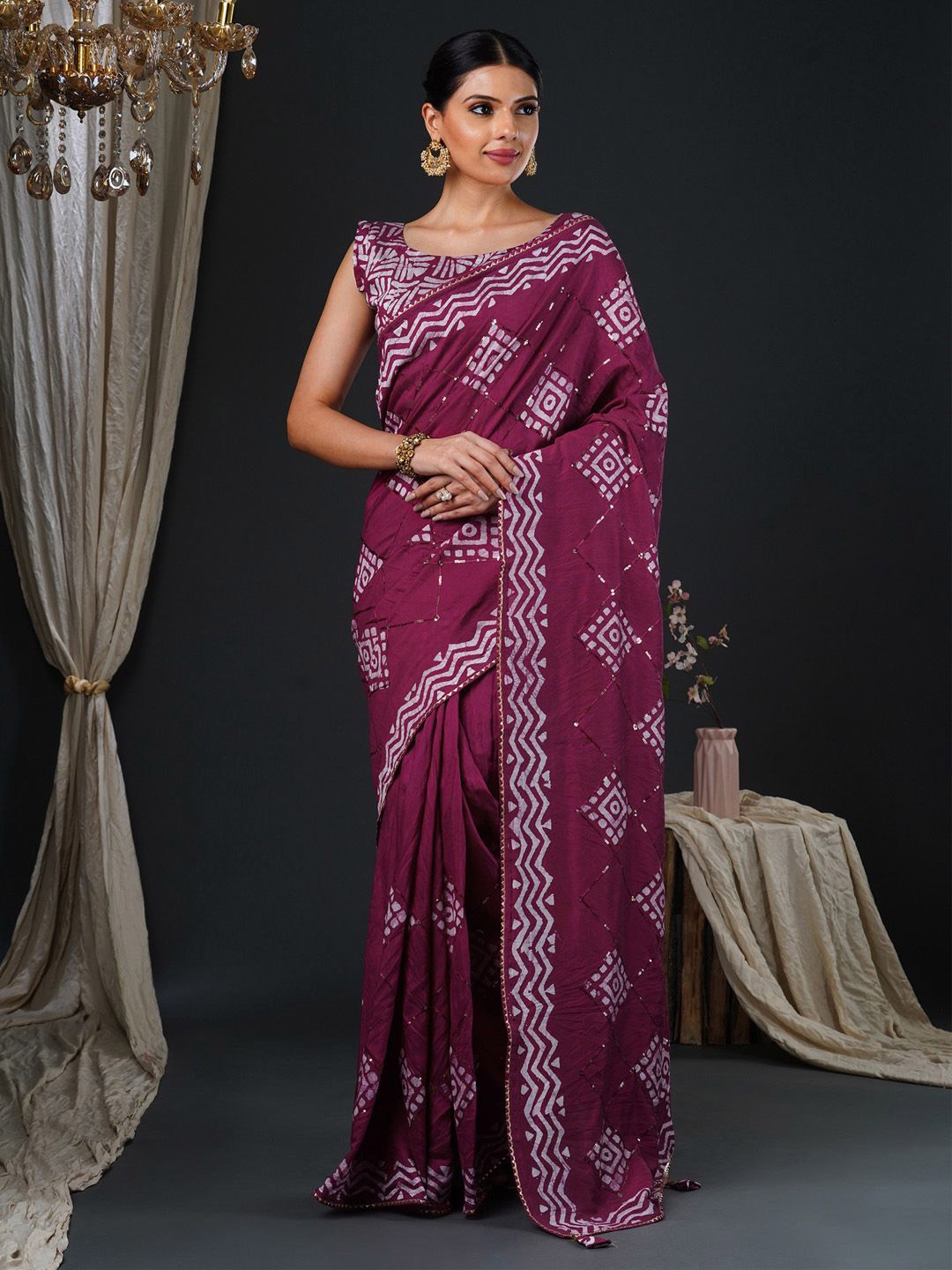 

Anouk Sequinned Silk Blend Magenta Embellished Party Wear Saree with Matching Blouse