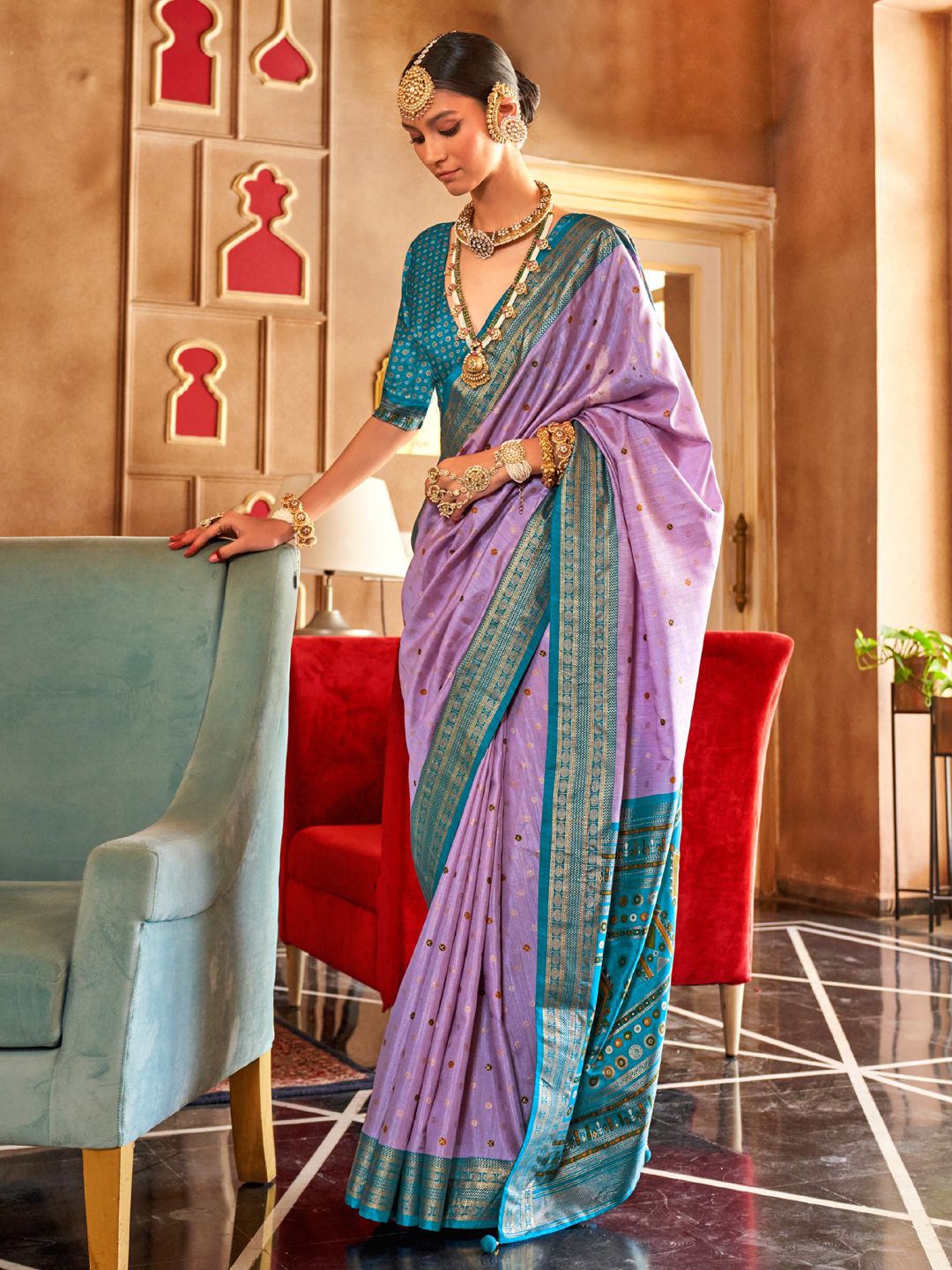 

Mitera Ethnic Motifs Woven Design Zari Patola Saree, Lavender