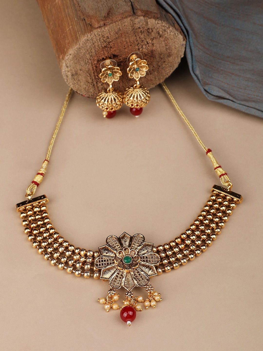 

ANIKAS CREATION Gold-Plated Stone Studded & Beaded Necklace & Earrings