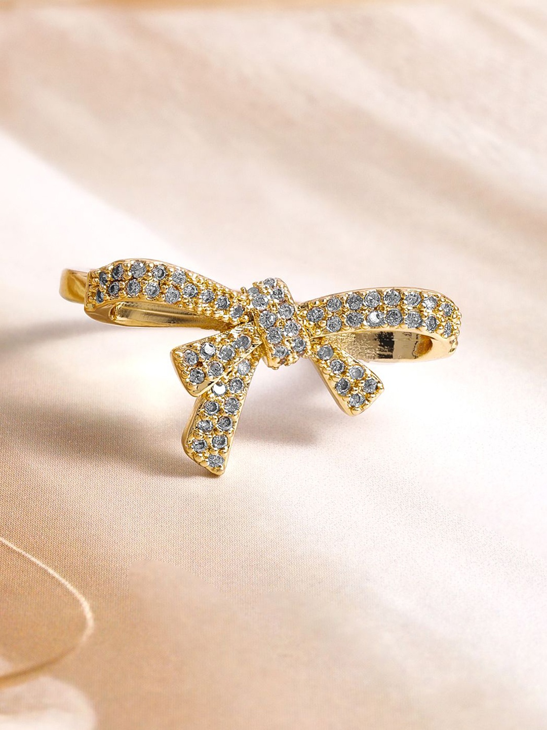 

Rubans 18K Gold Plated Bow Design Ring with Cubic Zirconia