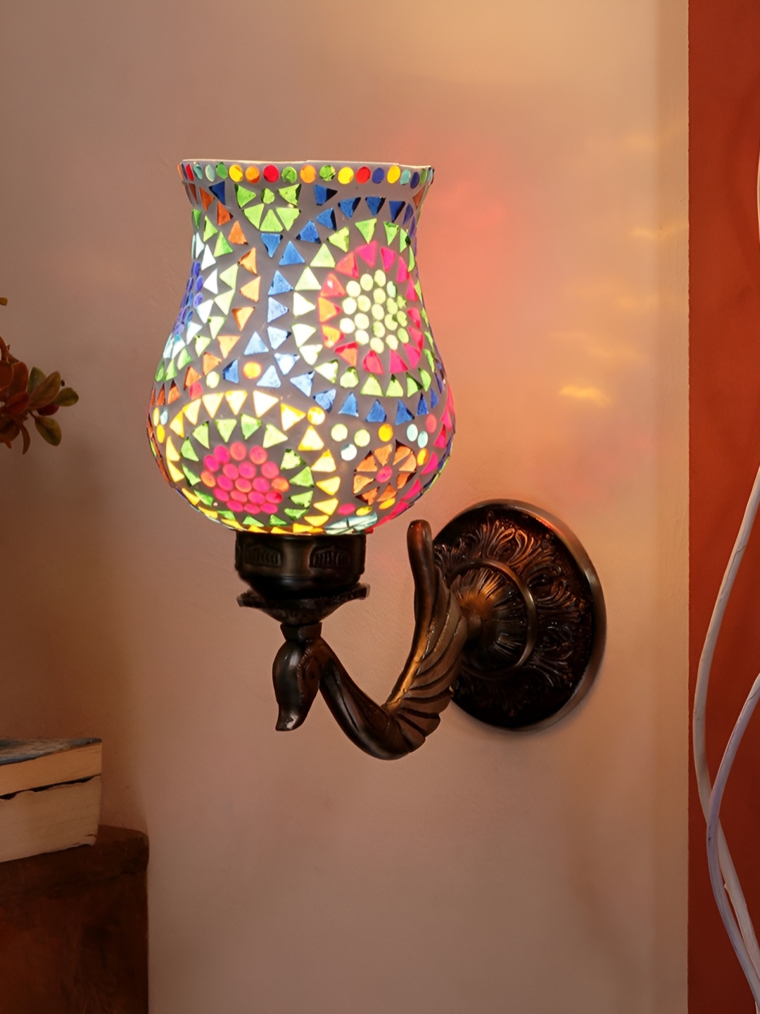 

Devansh White & Blue Ethnic Motifs Textured Bell Shaped Metal & Glass Wall Lamp