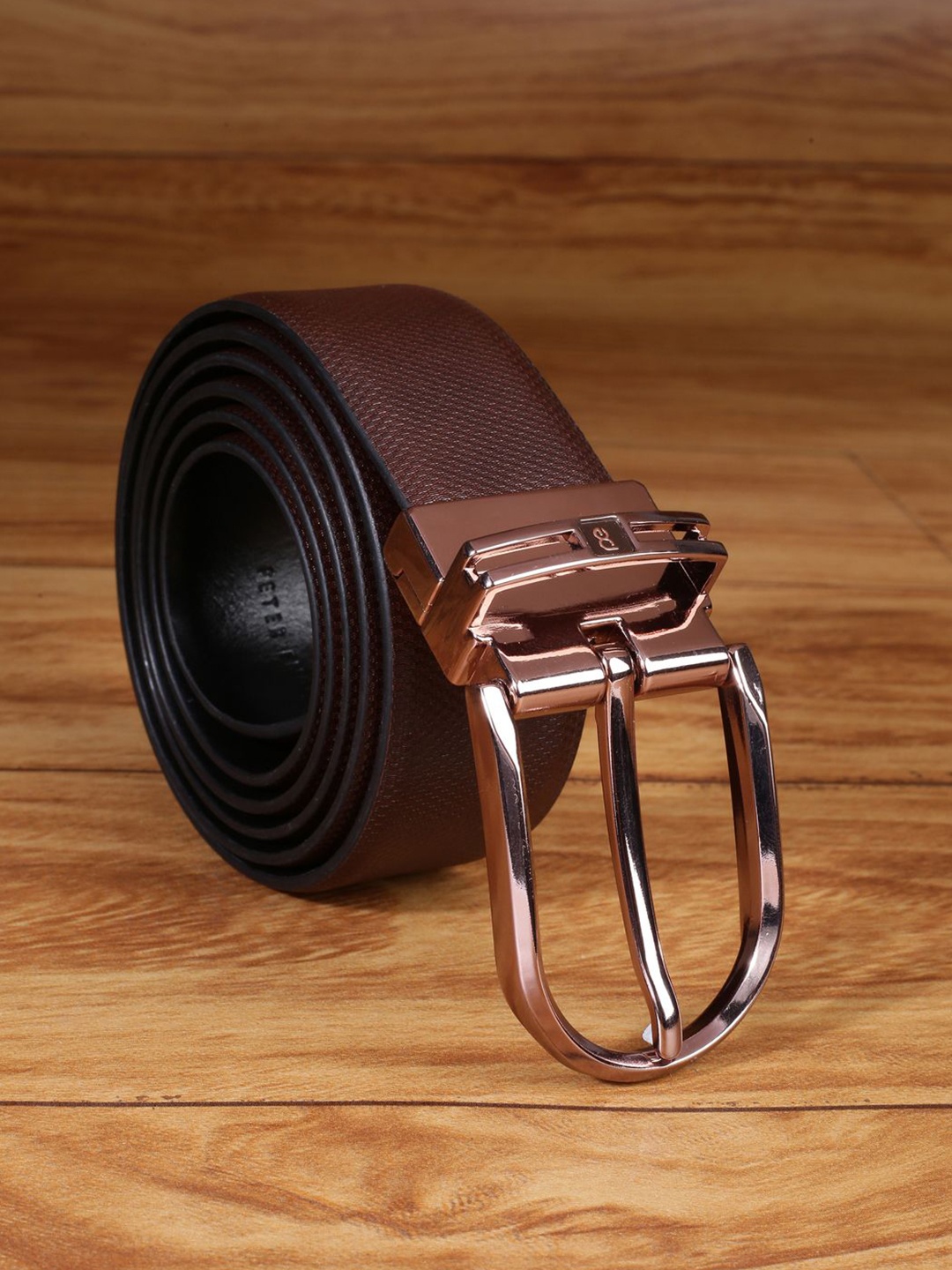 

Peter England Men Textured Leather Reversible Formal Belt, Brown