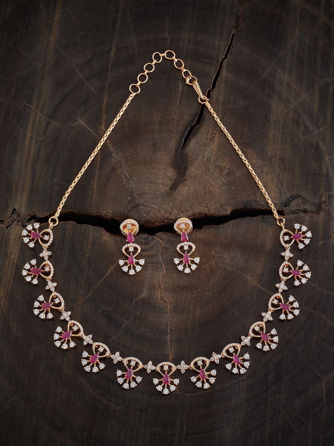 

Kushal's Fashion Jewellery Ruby Gold-Plated Copper Cubic Zirconia Studded Jewellery Set