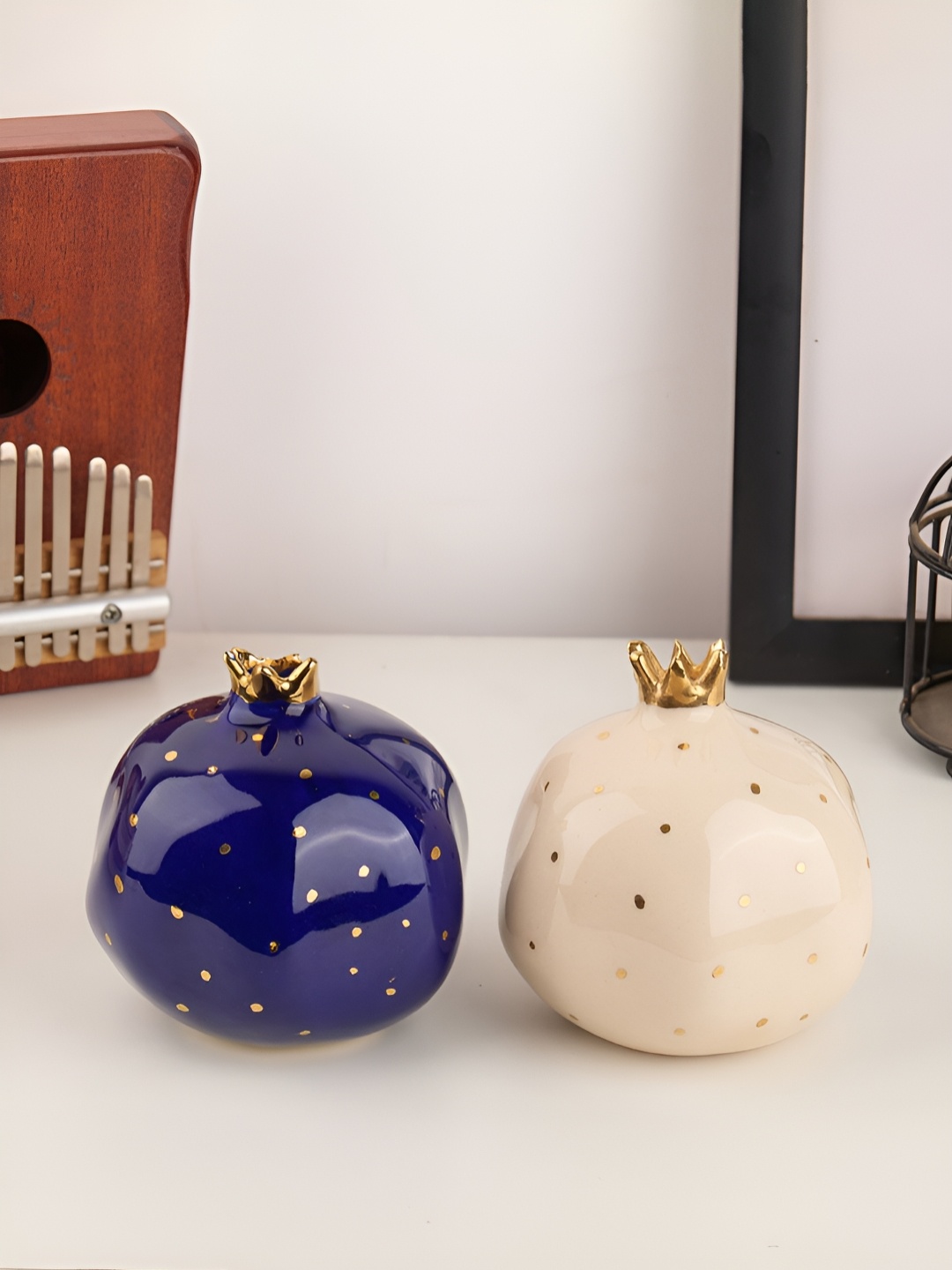 

Glimpse Homes Blue & Off-White 2 Pieces Pomegranate Figurine Showpieces