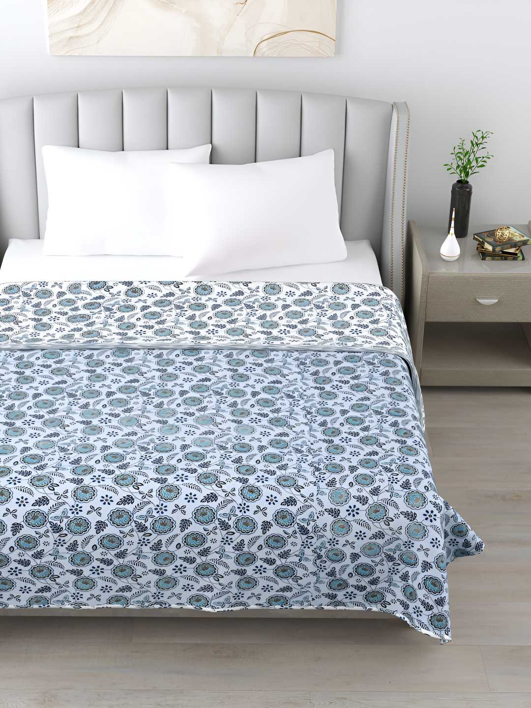 

Jinaya's Blue & White Floral AC Room 300 GSM Cotton Reversible Single Bed Dohar