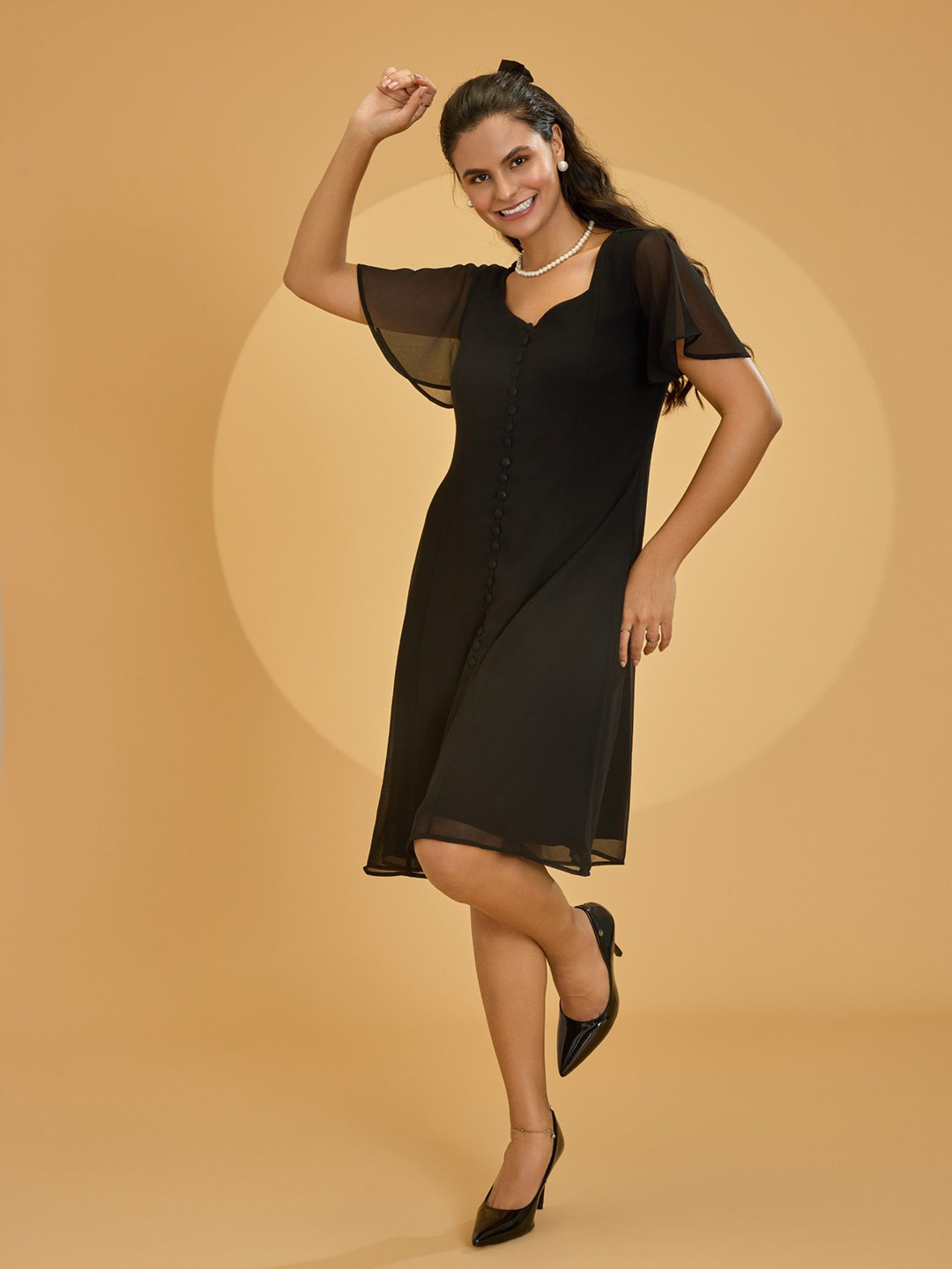 

Urban Sundari Women Embroidered Flared Sleeve Crepe A-Line Dress, Black