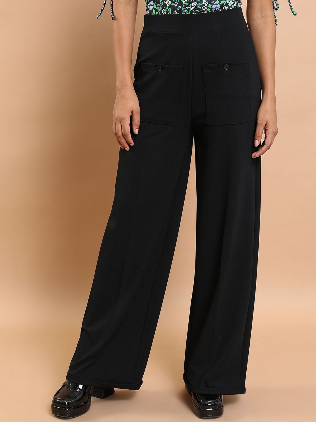 

Tokyo Talkies Women Flared Trousers, Black