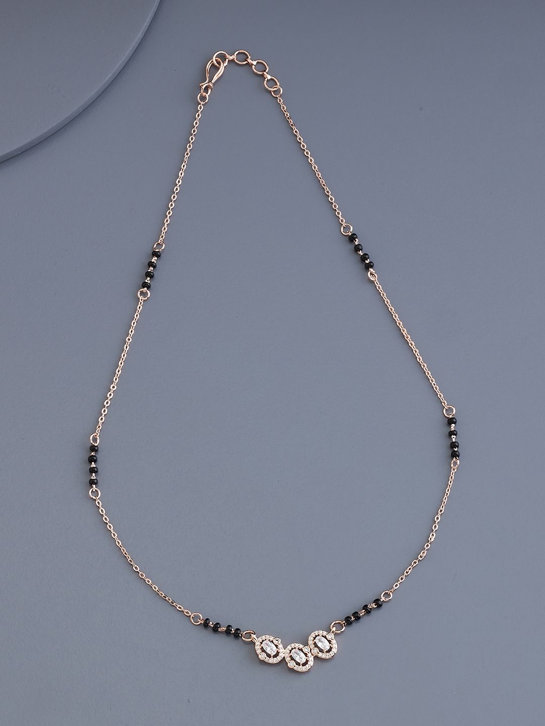 

Kushal's Fashion Jewellery Rose Gold-Plated Zircon Studded Mangalsutra