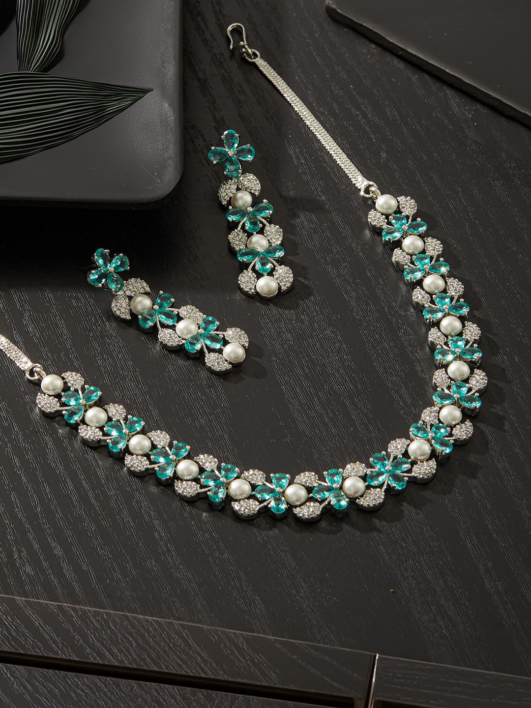 

Jazz and Sizzle Silver Plated American Diamond Studded & Beaded Jewellery Set