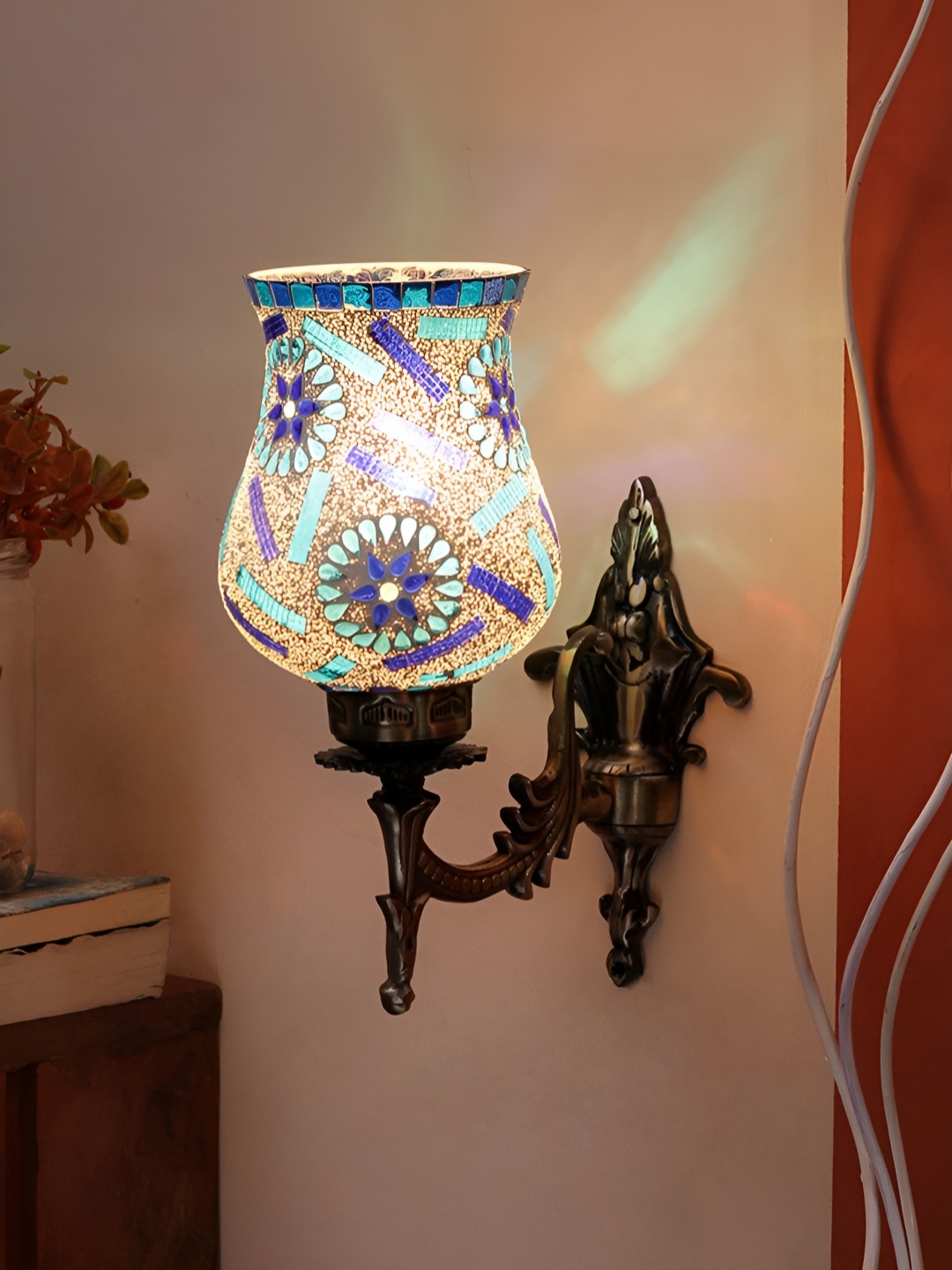 

Devansh White & Blue Floral Textured Bell Shaped Metal & Glass Wall Lamp