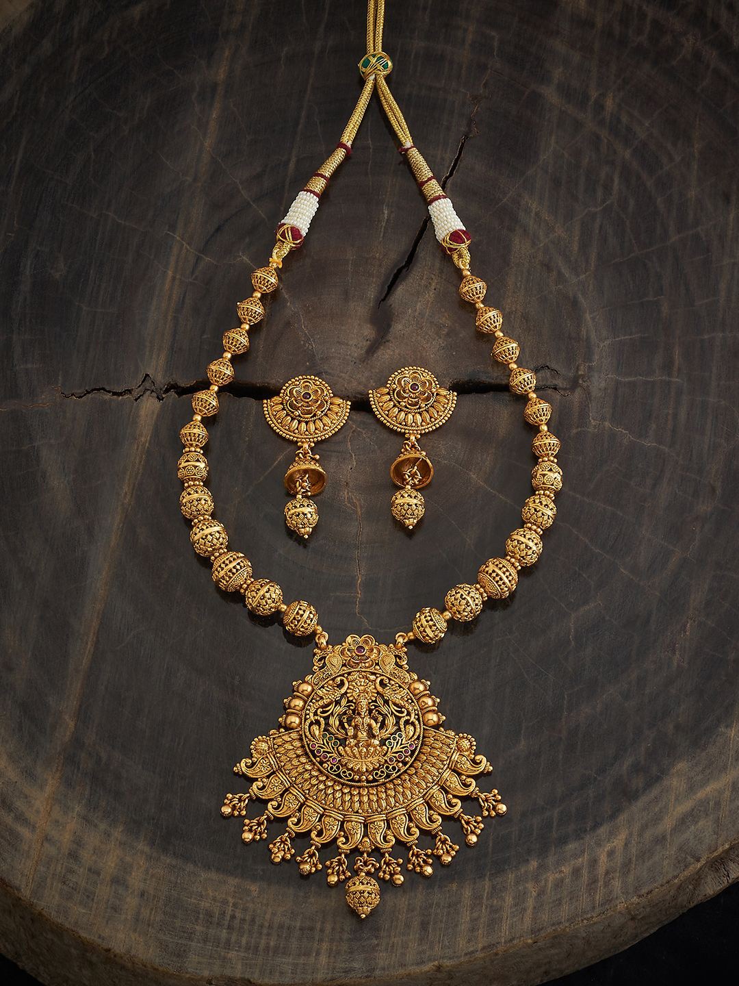 

Kushal's Fashion Jewellery Gold-Plated Stone-Studded Antique Jewellery Set