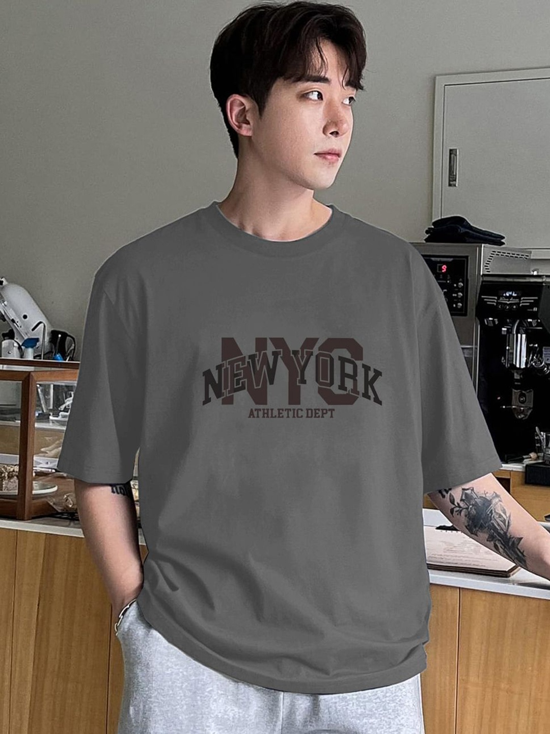 

CLAFOUTIS Men Typography Printed Drop-Shoulder Sleeves Cotton T-shirt, Grey