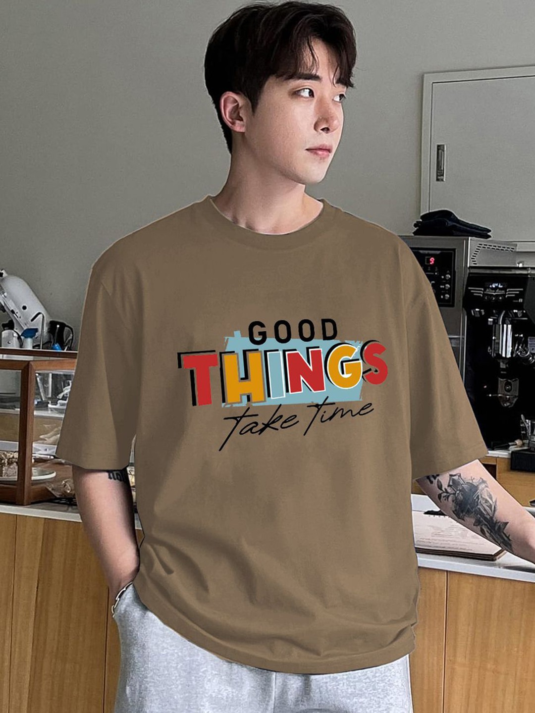 

CLAFOUTIS Men Cotton Typography Printed Drop-Shoulder Sleeves Oversized T-shirt, Brown