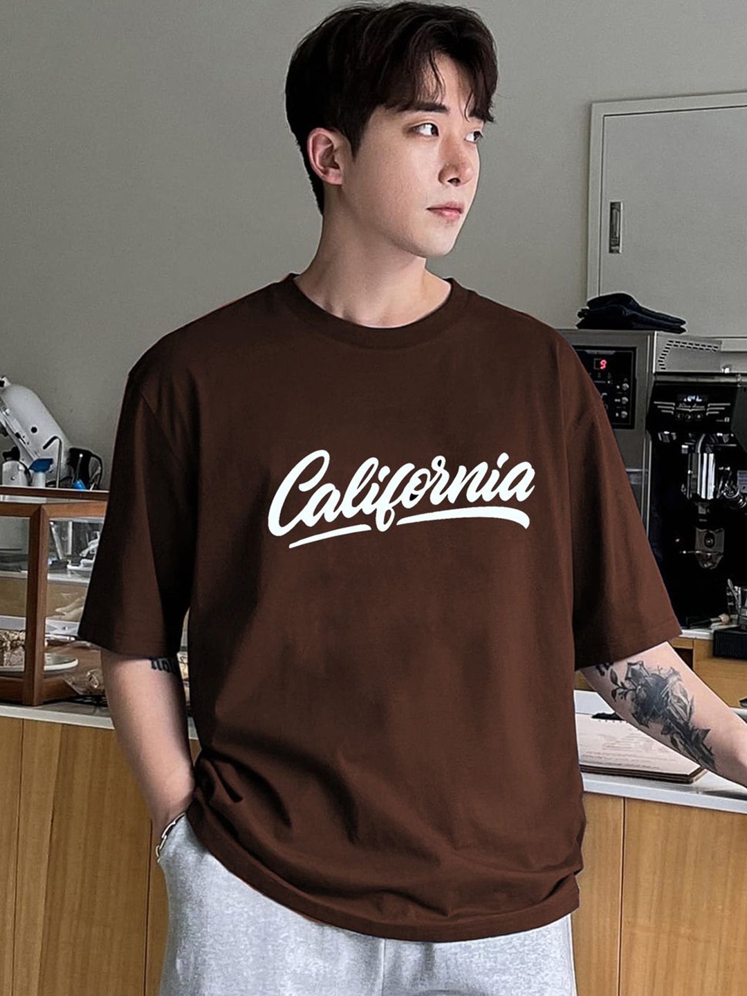 

CLAFOUTIS Men Typography Printed Round Neck Cotton Oversized T-shirt, Brown