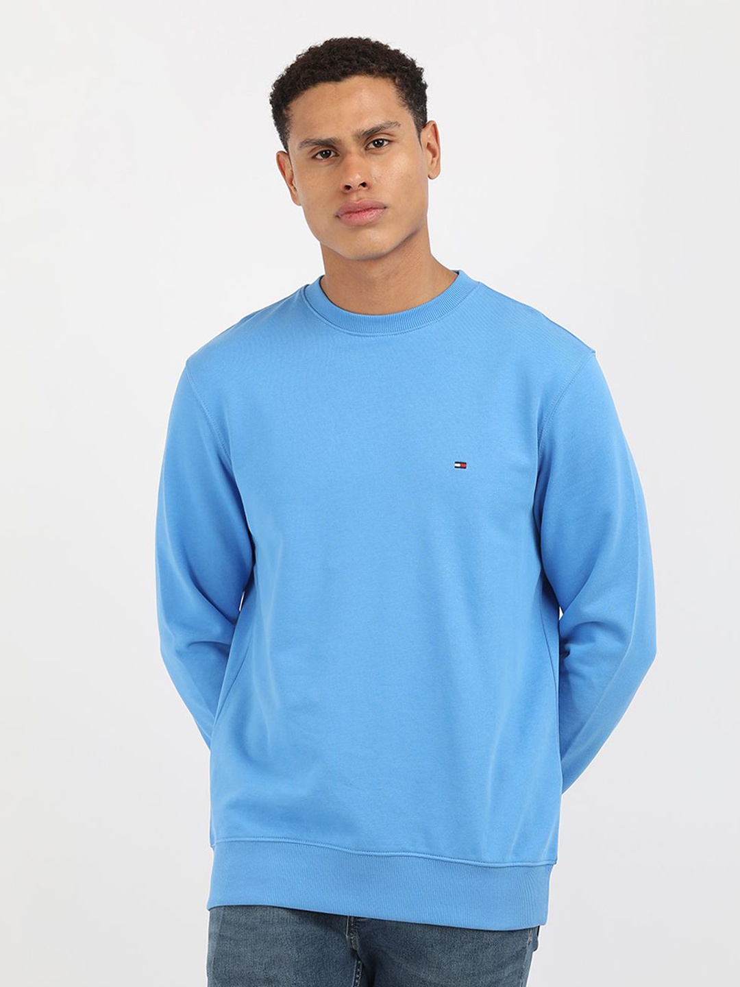 

Tommy Hilfiger Men Solid Round Neck Pure Cotton Sweatshirt, Blue