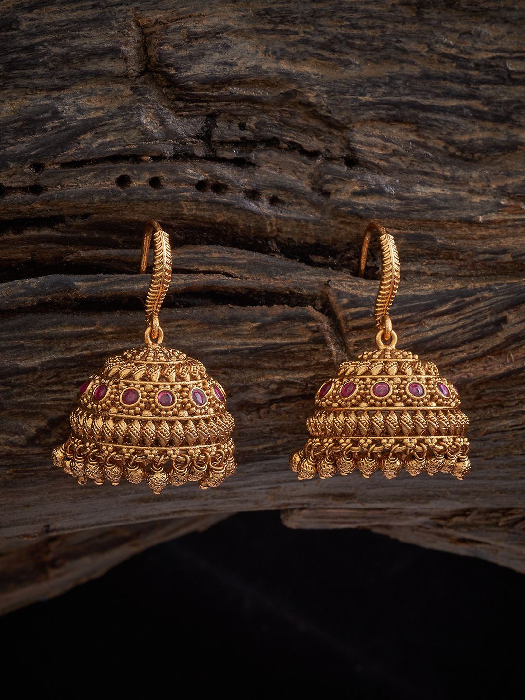

Kushal's Fashion Jewellery Gold-Plated Stone Studded Dome Shaped Antique Jhumkas