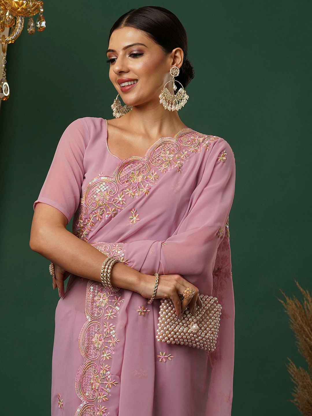 

Satrani Ethnic Motifs Sequinned Pure Georgette Saree, Pink