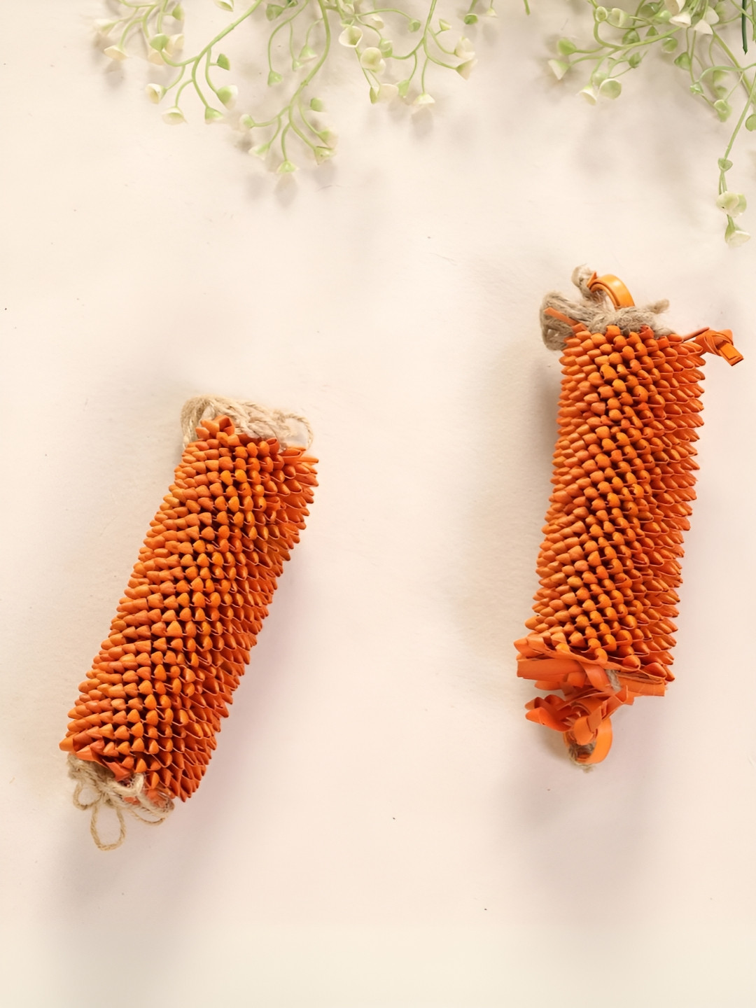 

Peepul Tree Orange 2 Pieces Palmleaf Toran Set
