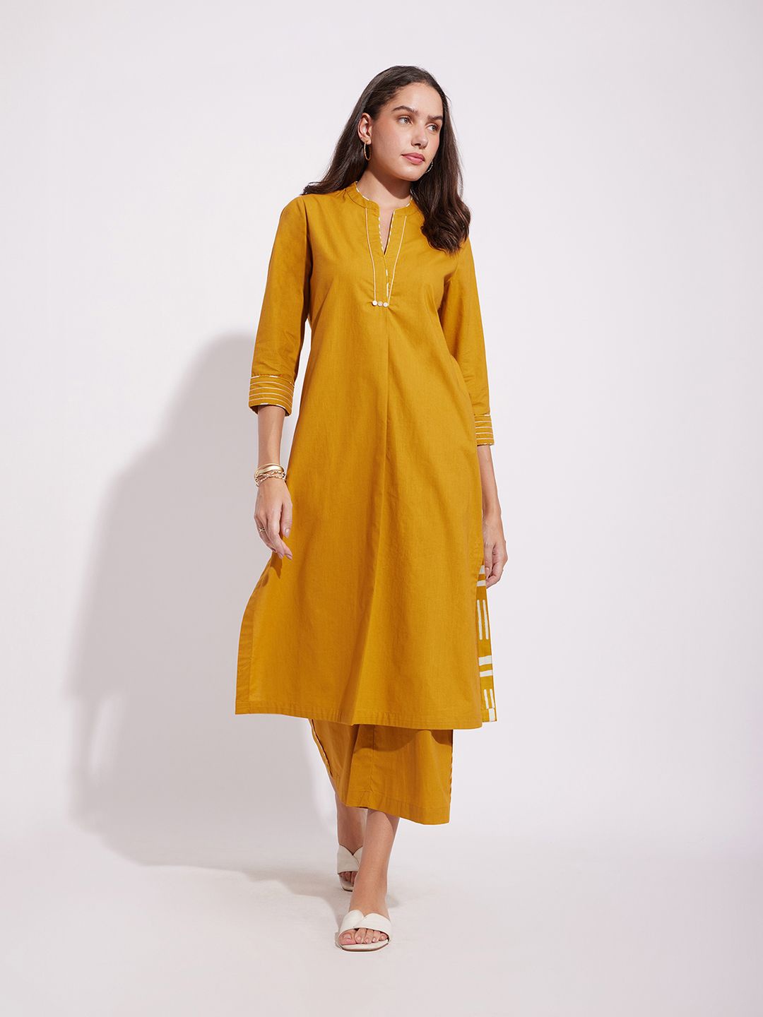 

Pink Fort Straight Pure Cotton Kurta with Trousers, Mustard