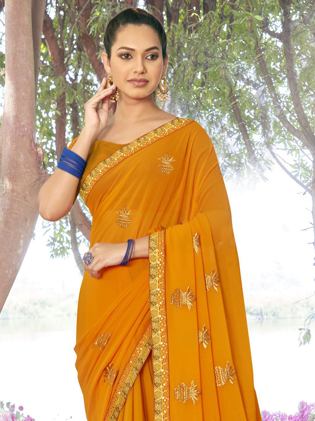 

Mitera Floral Embroidered Pure Georgette Bagru Saree, Yellow