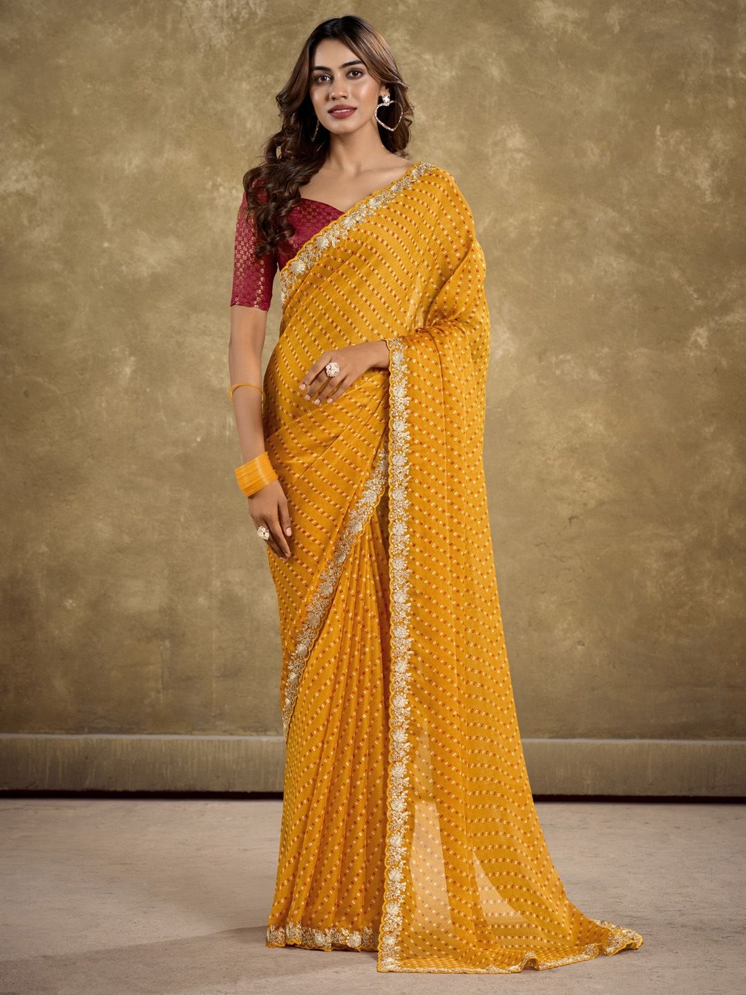 

Anouk Ethnic Motifs Embellished Bandhani Sequinned Saree, Mustard